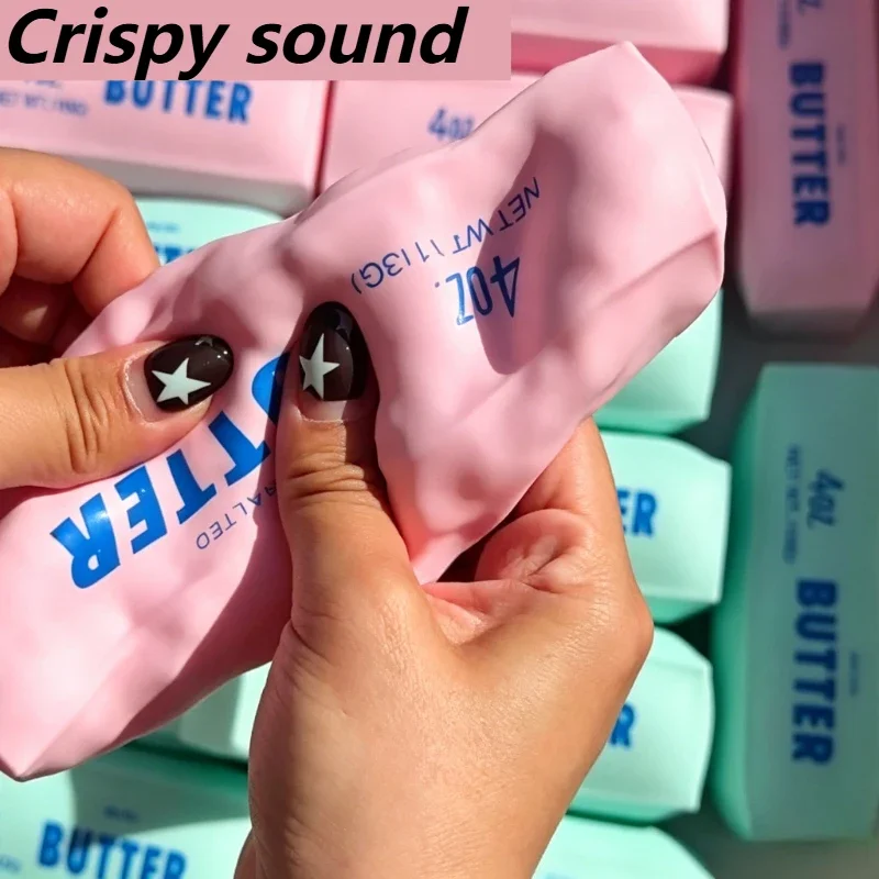 Novelty Gifts - Graźka maślna, miękka piłka antystresowa, zabawka
